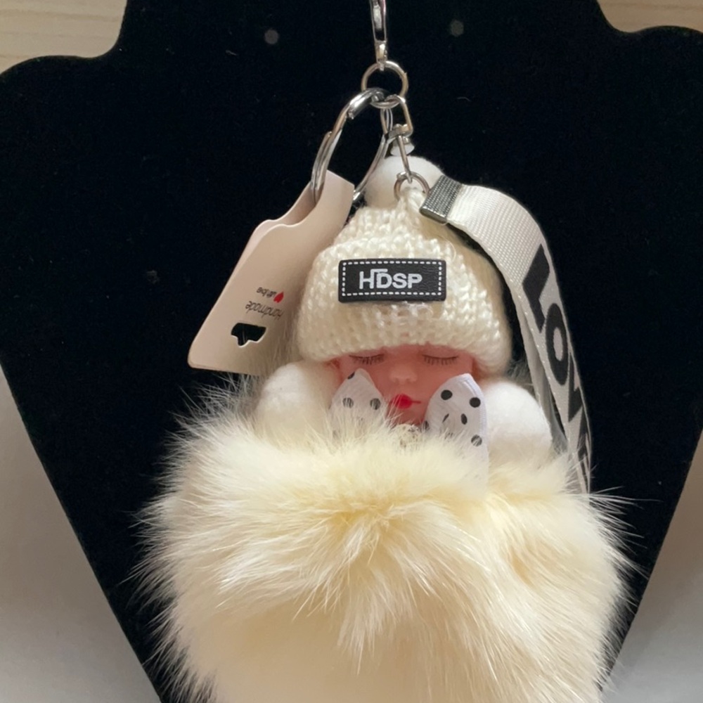 Love Cream and White Bag Charm with Pom-Pom